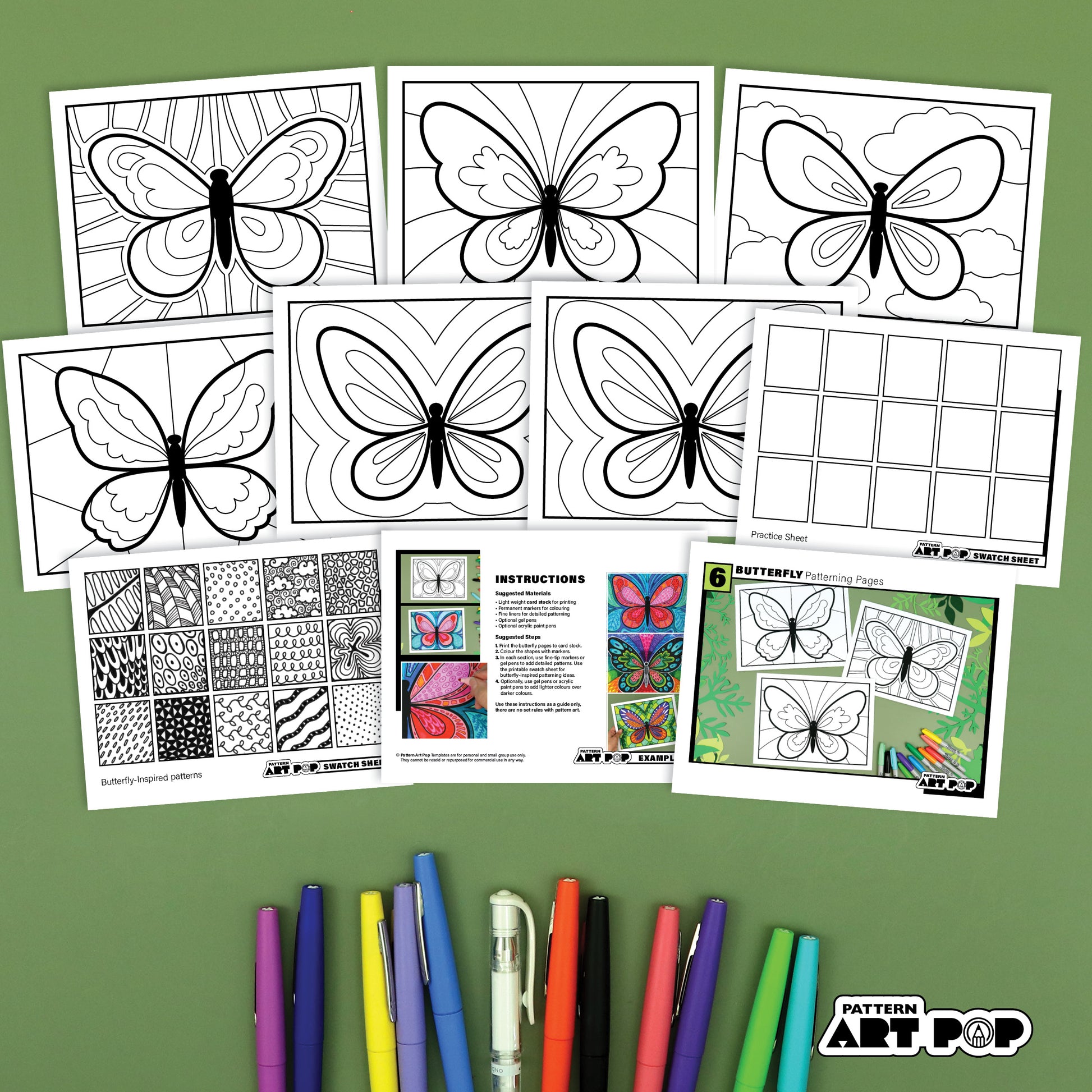 Butterfly pattern art pages with markers on a green background